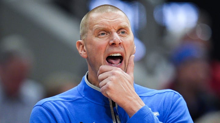 Kentucky Wildcats head coach Mark Pope watches as the Cards go up on Kentucky in the first half during the UofL-UK annual rivalry game at the KFC Yum! Center in Louisville, Kentucky Nov. 11, 2025.