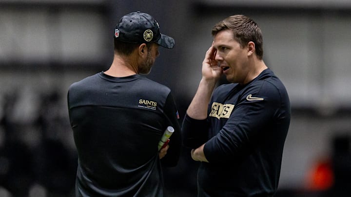 May 10, 2025; New Orleans, LA, USA; New Orleans Saints head coach Kellen Moore talks with defensive coordinator Brandon Staley during rookie minicamp at Ochsner Sports Performance Center. Mandatory Credit: Stephen Lew-Imagn Images May 10, 2025; New Orleans, LA, USA; New Orleans Saints head coach Kellen Moore talks with defensive coordinator Brandon Staley during rookie minicamp at Ochsner Sports Performance Center. Mandatory Credit: Stephen Lew-Imagn Images