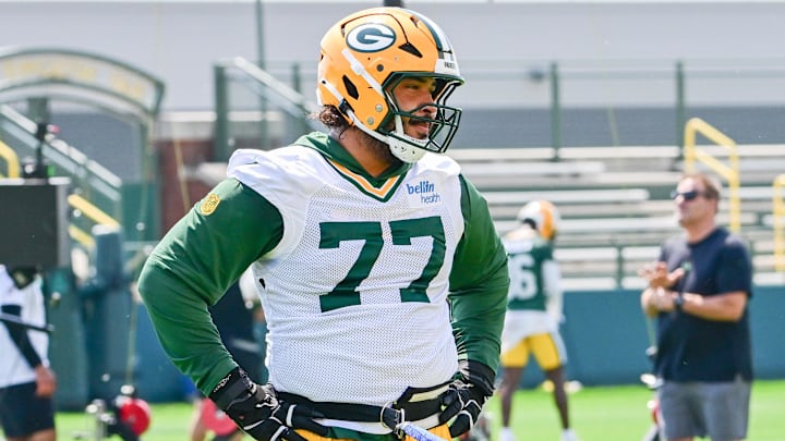 Jun 11, 2025; Green Bay, WI, USA;  Green Bay Packers offensive tackle Jordan Morgan (77) participates in the team's minicamp at Ray Nitschke Field.