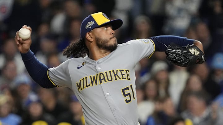 Oct 9, 2025; Chicago, Illinois, USA; Milwaukee Brewers pitcher Freddy Peralta (51) throws pitch against the Chicago Cubs during the first inning for game four of the NLDS round for the 2025 MLB playoffs at Wrigley Field. Mandatory Credit: David Banks-Imagn Images