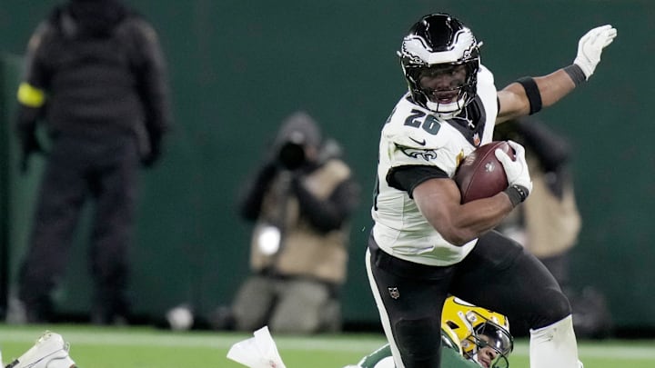 Philadelphia Eagles running back Saquon Barkley (26) leaves Green Bay Packers cornerback Carrington Valentine (24) is his wake on a 41-yard reception during the fourth quarter of their game Monday, November 10, 2025 at Lambeau Field in Green Bay, Wisconsin.