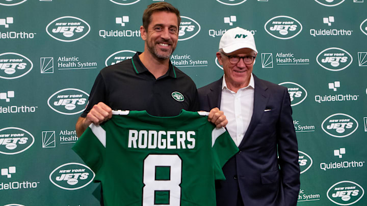 Apr 26, 2023; Florham Park, NJ, USA; New York Jets quarterback Aaron Rodgers (left) and owner Woody Johnson pose for a photo during the introductory press conference at Atlantic Health Jets Training Center. Mandatory Credit: Tom Horak-Imagn Images Apr 26, 2023; Florham Park, NJ, USA; New York Jets quarterback Aaron Rodgers (left) and owner Woody Johnson pose for a photo during the introductory press conference at Atlantic Health Jets Training Center. Mandatory Credit: Tom Horak-Imagn Images