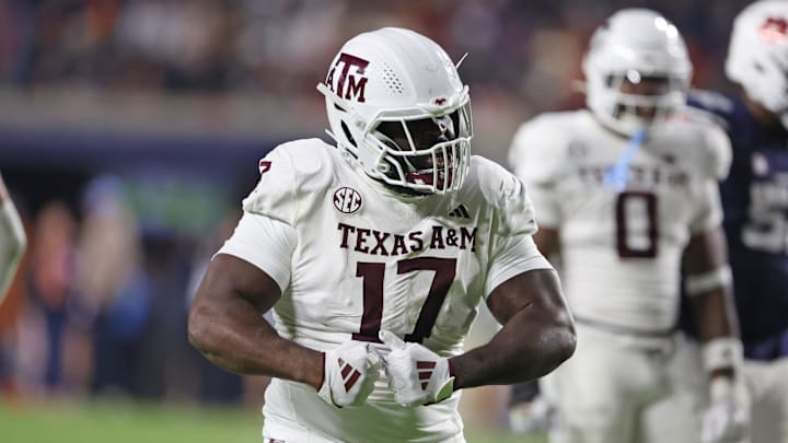 Nov 23, 2024; Auburn, Alabama, USA;  Texas A&M Aggies defensive lineman Albert Regis (17) reacts after making a tackle against the Auburn Tigers in the third quarter at Jordan-Hare Stadium. Mandatory Credit: John Reed-Imagn Images
