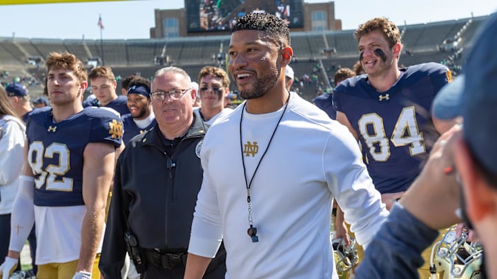 Apr 12, 2025; Notre Dame, IN, USA; Notre Dame Fighting Irish head coach Marcus Freeman smiles as he walks off the field after the Blue-Gold game at Notre Dame Stadium. Mandatory Credit: Michael Caterina-Imagn Images