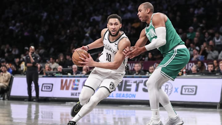 Feb 13, 2024; Brooklyn, New York, USA;  Brooklyn Nets guard Ben Simmons (10) drives past Boston Celtics center Al Horford (42) in the third quarter at Barclays Center. Mandatory Credit: Wendell Cruz-Imagn Images