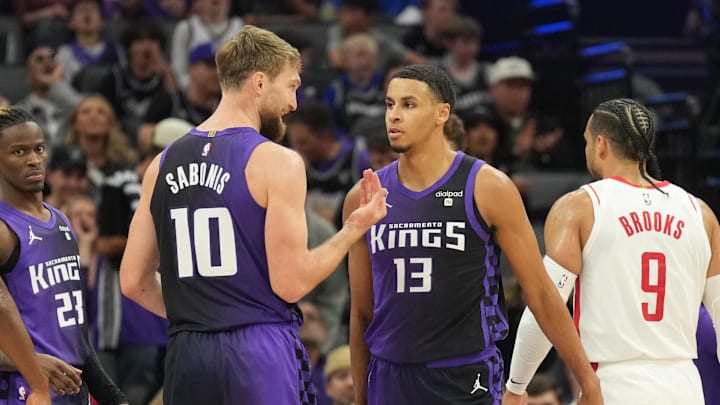 Mar 10, 2024; Sacramento, California, USA; Sacramento Kings forward Domantas Sabonis (10) talks with forward Keegan Murray (13) during the third quarter against the Houston Rockets at Golden 1 Center. Mandatory Credit: Darren Yamashita-Imagn Images