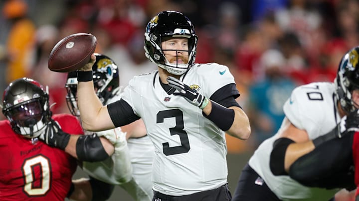 Dec 24, 2023; Tampa, Florida, USA; Jacksonville Jaguars quarterback C.J. Beathard (3) drops back to pass against the Tampa Bay Buccaneers in the fourth quarter at Raymond James Stadium. Mandatory Credit: Nathan Ray Seebeck-Imagn Images Dec 24, 2023; Tampa, Florida, USA; Jacksonville Jaguars quarterback C.J. Beathard (3) drops back to pass against the Tampa Bay Buccaneers in the fourth quarter at Raymond James Stadium. Mandatory Credit: Nathan Ray Seebeck-Imagn Images