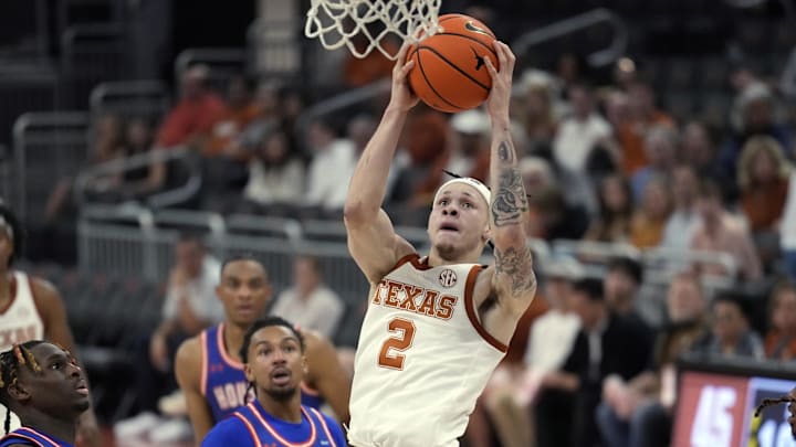 Nov 8, 2024; Austin, Texas, USA; Texas Longhorns guard Chendall Weaver (2) lays in a basket during the second half against the Houston Christian Huskies at Moody Center. Mandatory Credit: Scott Wachter-Imagn Images