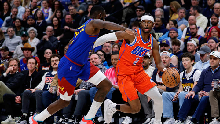 Feb 1, 2026; Denver, Colorado, USA; Oklahoma City Thunder guard Shai Gilgeous-Alexander (2) controls the ball as Denver Nuggets guard Tim Hardaway Jr. (10) guards in the second quarter at Ball Arena. Mandatory Credit: Isaiah J. Downing-Imagn Images Feb 1, 2026; Denver, Colorado, USA; Oklahoma City Thunder guard Shai Gilgeous-Alexander (2) controls the ball as Denver Nuggets guard Tim Hardaway Jr. (10) guards in the second quarter at Ball Arena. Mandatory Credit: Isaiah J. Downing-Imagn Images