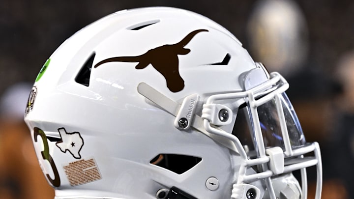Nov 30, 2024; College Station, Texas, USA; A detail view of a Texas Longhorns helmet on the sideline during the first quarter against the Texas A&M Aggies. The Longhorns defeated the Aggies 17-7 at Kyle Field. Mandatory Credit: Maria Lysaker-Imagn Images  