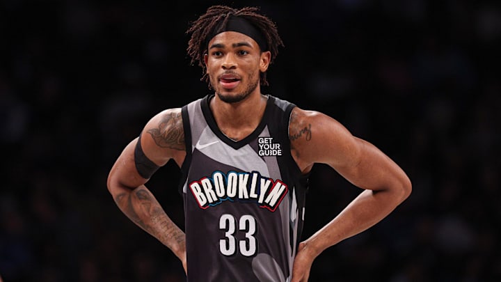 Mar 24, 2025; Brooklyn, New York, USA; Brooklyn Nets center Nic Claxton (33) looks on during the first half against the Dallas Mavericks at Barclays Center. Mandatory Credit: Vincent Carchietta-Imagn Images