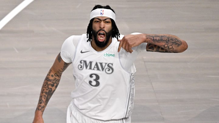 Feb 8, 2025; Dallas, Texas, USA; Dallas Mavericks forward Anthony Davis (3) celebrates after he dunks the ball against the Houston Rockets during the first quarter at American Airlines Center. Mandatory Credit: Jerome Miron-Imagn Images