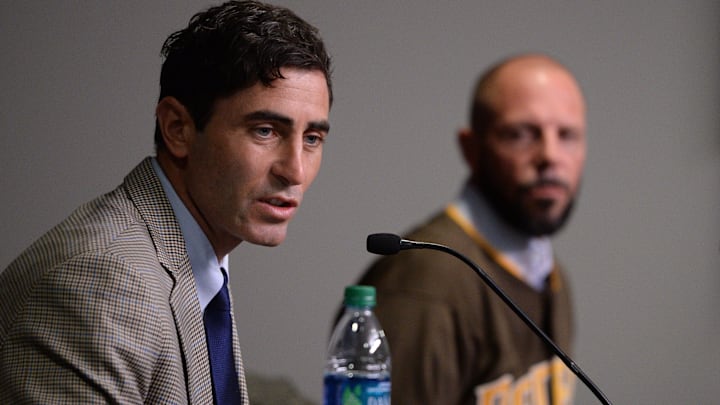 San Diego Padres general manager AJ Preller (left) speaks to the media as manager Jayce Tingler is introduced at Petco Park on Oct. 31, 2019.