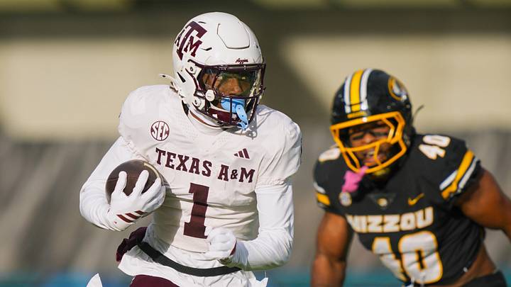 Texas A&M Aggies wide receiver Mario Craver (1) runs with the ball during the first half against the Missouri Tigers at Faurot Field at Memorial Stadium. Texas A&M Aggies wide receiver Mario Craver (1) runs with the ball during the first half against the Missouri Tigers at Faurot Field at Memorial Stadium.