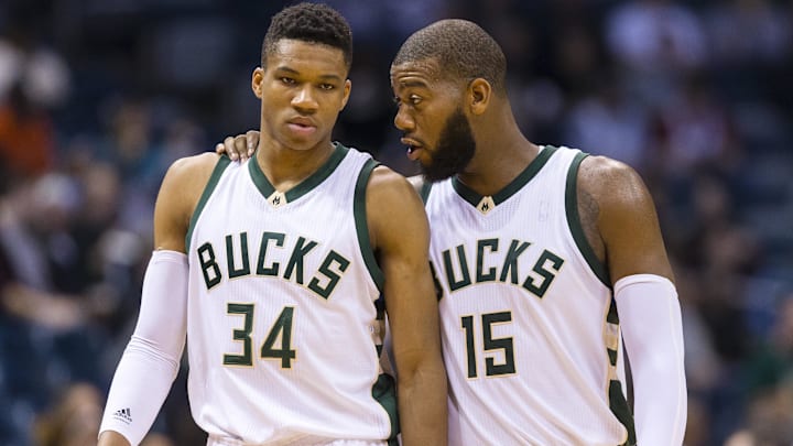 Oct 10, 2015; Milwaukee, WI, USA; Milwaukee Bucks center Greg Monroe (15) talks with forward Giannis