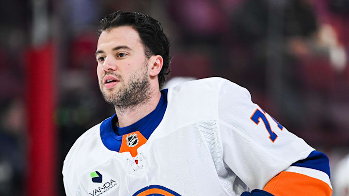 Mar 21, 2026; Montreal, Quebec, CAN; New York Islanders defenseman Tony DeAngelo (77) looks on during warm-up before the game against the Montreal Canadiens at Bell Centre. Mandatory Credit: David Kirouac-Imagn Images