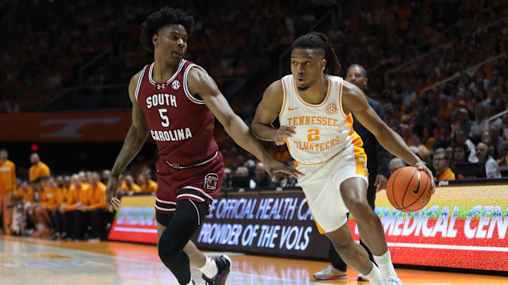 Mar 8, 2025; Knoxville, Tennessee, USA; Tennessee Volunteers guard Chaz Lanier (2) moves the ball against South Carolina Gamecocks forward Nick Pringle (5) during the first half at Thompson-Boling Arena at Food City Center. Mandatory Credit: Randy Sartin-Imagn Images Mar 8, 2025; Knoxville, Tennessee, USA; Tennessee Volunteers guard Chaz Lanier (2) moves the ball against South Carolina Gamecocks forward Nick Pringle (5) during the first half at Thompson-Boling Arena at Food City Center. Mandatory Credit: Randy Sartin-Imagn Images