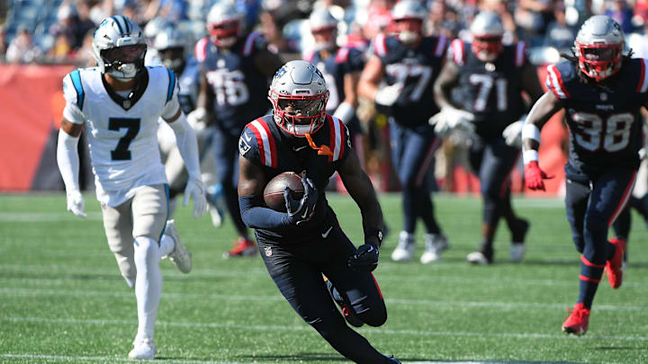 New England Patriots wide receiver Stefon Diggs (8) runs with the ball during the second half 