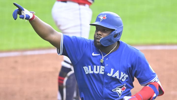 Jun 25, 2025; Cleveland, Ohio, USA; Toronto Blue Jays first baseman Vladimir Guerrero Jr. (27) celebrates his solo home run in the fourth inning against the Cleveland Guardians at Progressive Field. 