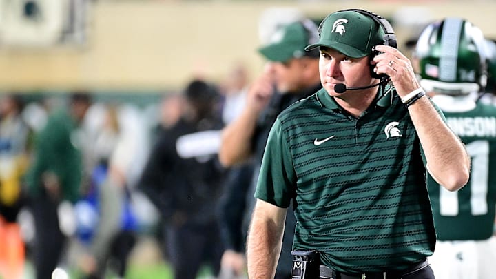 Sep 28, 2024; East Lansing, Michigan, USA; Michigan State Spartans head coach Jonathan Smith watches from the sidelines during the fourth quarter as the Ohio State Buckeyes defeat his team at Spartan Stadium. Mandatory Credit: Dale Young-Imagn Images