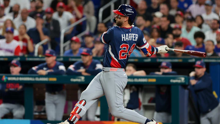 Mar 15, 2026; Miami, FL, United States; United States first baseman Bryce Harper (24) hits a double in the third inning against the Dominican Republic during a semifinal game of the 2026 World Baseball Classic at loanDepot Park. Mandatory Credit: Sam Navarro-Imagn Images Mar 15, 2026; Miami, FL, United States; United States first baseman Bryce Harper (24) hits a double in the third inning against the Dominican Republic during a semifinal game of the 2026 World Baseball Classic at loanDepot Park. Mandatory Credit: Sam Navarro-Imagn Images