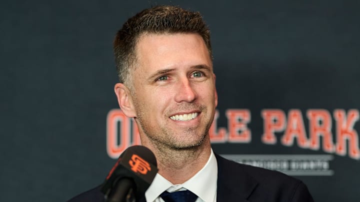 Dec 12, 2024; San Francisco, CA, USA; San Francisco Giants president of baseball operations Buster Posey speaks during the introductory press conference for shortstop Willy Adames (not pictured) at Oracle Park.  
