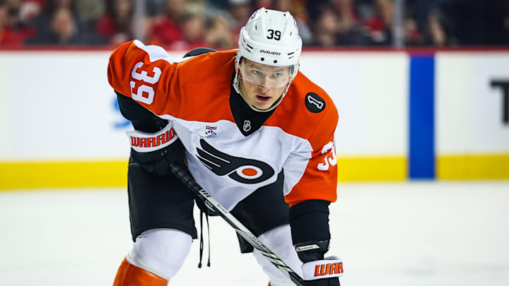 Dec 31, 2025; Calgary, Alberta, CAN; Philadelphia Flyers right wing Matvei Michkov (39) during the face off against the Calgary Flames during the first period at Scotiabank Saddledome.