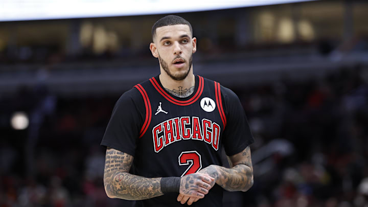 Dec 6, 2024; Chicago, Illinois, USA; Chicago Bulls guard Lonzo Ball (2) walks back to the bench during the first half at United Center. 
