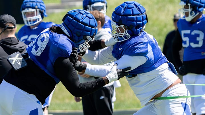 University of Kentucky offensive linebacker practices against offensive linebacker Malachi Wood during spring football practice on Saturday, April 6, 2024.