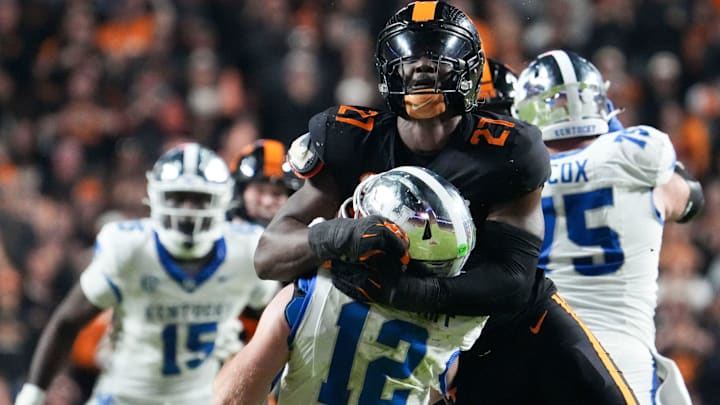 Tennessee defensive lineman James Pearce Jr. (27) takes down Kentucky quarterback Brock Vandagriff (12) during an NCAA college football game between Tennessee and Kentucky on Saturday, Nov. 2, 2024, in Knoxville, Tenn.