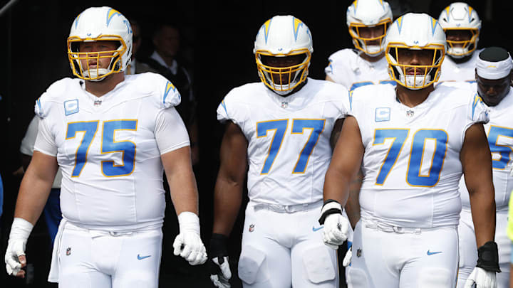  Los Angeles Chargers center Bradley Bozeman and guard Zion Johnson and offensive tackle Rashawn Slater take the field against the Pittsburgh Steelers at Acrisure Stadium. 