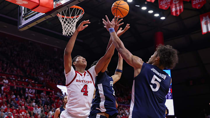 Rutgers Scarlet Knights guard Ace Bailey (4) battles Penn State Nittany Lions guard Puff Johnson (5) for the ball during the second half at Jersey Mike's Arena.