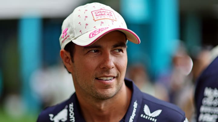 May 5, 2024; Miami Gardens, Florida, USA; Red Bull Racing driver Sergio Perez (11) walks in the paddock before the F1 Miami Grand Prix at Miami International Autodrome. Mandatory Credit: Peter Casey-USA TODAY Sports