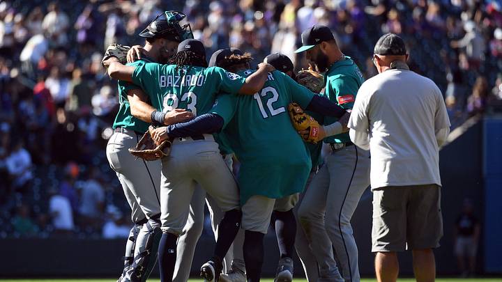 Sep 20, 2026; Denver, Colorado, USA; Seattle Mariners players celebrate after a win against the Colorado Rockies at Coors Field. Mandatory Credit: Christopher Hanewinckel-Imagn Images Sep 20, 2026; Denver, Colorado, USA; Seattle Mariners players celebrate after a win against the Colorado Rockies at Coors Field. Mandatory Credit: Christopher Hanewinckel-Imagn Images