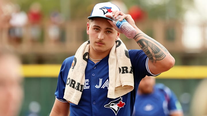 Mar 21, 2024; Bradenton, Florida, USA; Toronto Blue Jays pitcher Ricky Tiedemann (70) walks to the dugout before the game against the Pittsburgh Pirates at LECOM Park. Mandatory Credit: Kim Klement Neitzel-Imagn Images
