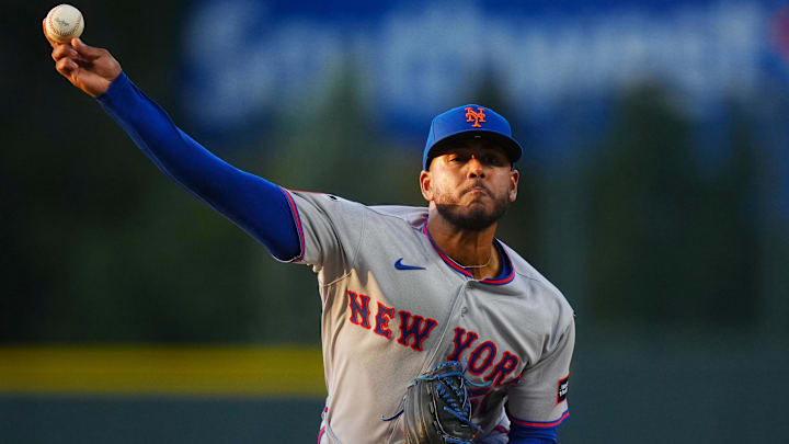 May 6, 2026; Denver, Colorado, USA; New York Mets starting pitcher Freddy Peralta (51) delivers a pitch against the Colorado Rockies in the first inning at Coors Field. Mandatory Credit: Ron Chenoy-Imagn Images