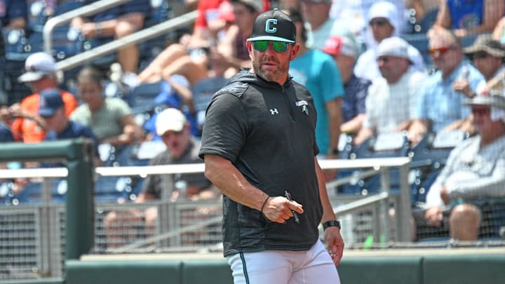 Jun 13, 2025; Omaha, Neb, USA; Coastal Carolina Chanticleers head coach Kevin Schnall looks to the field during the game against the Arizona Wildcats during the fifth inning at Charles Schwab Field. Mandatory Credit: Steven Branscombe-Imagn Images Jun 13, 2025; Omaha, Neb, USA; Coastal Carolina Chanticleers head coach Kevin Schnall looks to the field during the game against the Arizona Wildcats during the fifth inning at Charles Schwab Field. Mandatory Credit: Steven Branscombe-Imagn Images