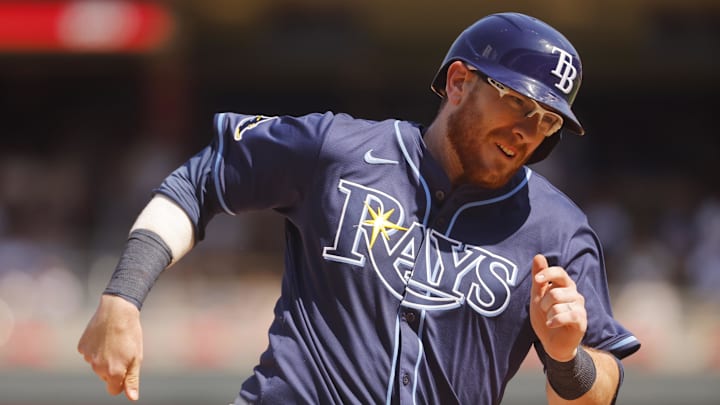 Danny Jansen scores on a double against the Twins.