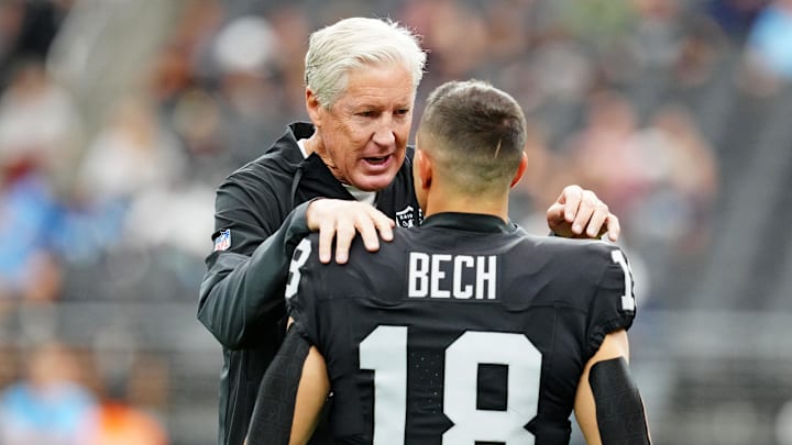 Oct 12, 2025; Paradise, Nevada, USA; Las Vegas Raiders wide receiver Jack Bech (18) and Las Vegas Raiders head coach Pete Carroll talk before the game against the Tennessee Titans at Allegiant Stadium. Mandatory Credit: Stephen R. Sylvanie-Imagn Images Oct 12, 2025; Paradise, Nevada, USA; Las Vegas Raiders wide receiver Jack Bech (18) and Las Vegas Raiders head coach Pete Carroll talk before the game against the Tennessee Titans at Allegiant Stadium. Mandatory Credit: Stephen R. Sylvanie-Imagn Images