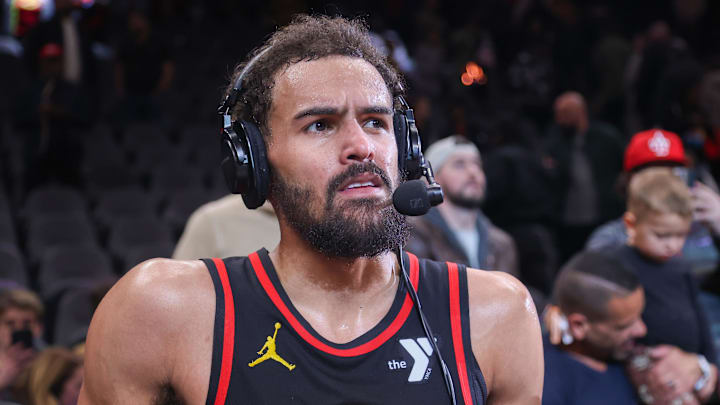 Mar 6, 2025; Atlanta, Georgia, USA; Atlanta Hawks guard Trae Young (11) does an interview after a victory over the Indiana Pacers at State Farm Arena. Mandatory Credit: Brett Davis-Imagn Images
