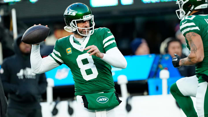 New York Jets quarterback Aaron Rodgers (8) warms up before the game, Sunday January 5, 2025, in East Rutherford.