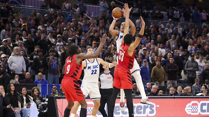 Nov 10, 2025; Orlando, Florida, USA; Orlando Magic guard Desmond Bane (3) shoots the ball at the buzzer against the Portland Trail Blazers in the fourth quarter at Kia Center. Mandatory Credit: Nathan Ray Seebeck-Imagn Images