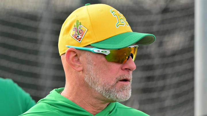 Feb 11, 2026; Mesa, AZ, USA; Athletics manager Mark Kotsay (7) looks on during a Spring Training workout at HoHhokum stadium. Mandatory Credit: Matt Kartozian-Imagn Images Feb 11, 2026; Mesa, AZ, USA; Athletics manager Mark Kotsay (7) looks on during a Spring Training workout at HoHhokum stadium. Mandatory Credit: Matt Kartozian-Imagn Images