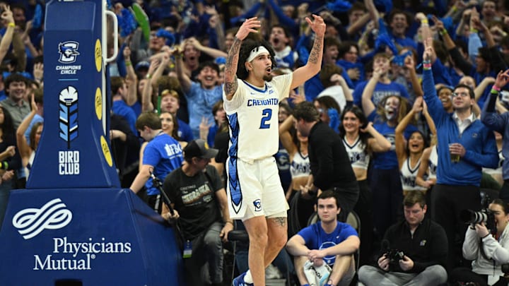 Dec 4, 2024; Omaha, Nebraska, USA; Creighton Bluejays guard Pop Isaacs (2) reacts to the crowd after making a three point basket against the Kansas Jayhawks during the second half at CHI Health Center Omaha. Mandatory Credit: Steven Branscombe-Imagn Images