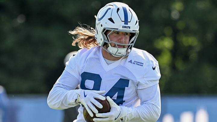 Indianapolis Colts tight end Tyler Warren (84) participates in a drill on day three of training camp at Grand Park Sports Campus. Mandatory Credit: Robert Goddin-Imagn Images