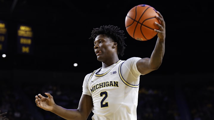 Feb 24, 2026; Ann Arbor, Michigan, USA; Michigan Wolverines guard L.J. Cason (2) grabs a rebound in the second half against the Minnesota Golden Gophers at Crisler Center. Mandatory Credit: Rick Osentoski-Imagn Images Feb 24, 2026; Ann Arbor, Michigan, USA; Michigan Wolverines guard L.J. Cason (2) grabs a rebound in the second half against the Minnesota Golden Gophers at Crisler Center. Mandatory Credit: Rick Osentoski-Imagn Images