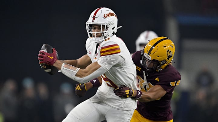 Dec 7, 2024; Arlington, TX, USA; Iowa State Cyclones wide receiver Jayden Higgins (9) and Arizona State Sun Devils defensive back Kyan McDonald (38) in action during the game between the Iowa State Cyclones and the Arizona State Sun Devils at AT&T Stadium. Mandatory Credit: Jerome Miron-Imagn Images