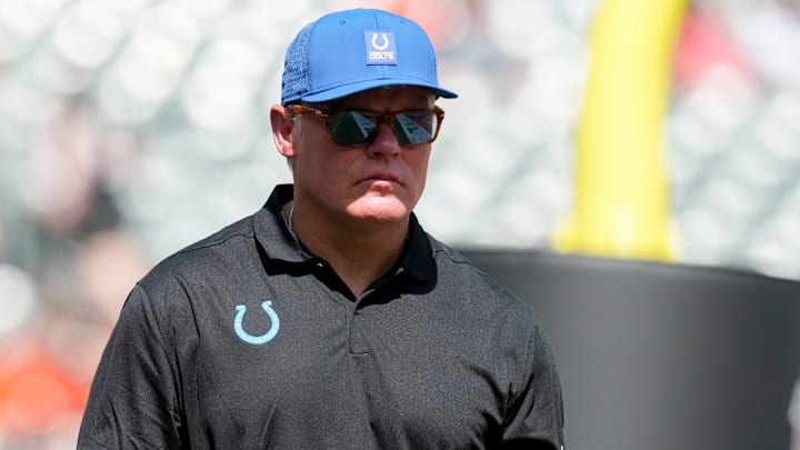 Indianapolis Colts general manager Chris Ballard leaves the field Saturday, Aug. 23, 2025, during a game against the Cincinnati Bengals at Paycor Stadium in Cincinnati.