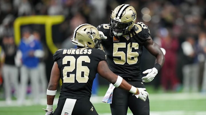 Oct 5, 2025; New Orleans, Louisiana, USA; New Orleans Saints safety Terrell Burgess (26) and New Orleans Saints outside linebacker Demario Davis (56) celebrate a pass break up against the New York Giants during the second quarter at Caesars Superdome. Mandatory Credit: Matthew Hinton-Imagn Images Oct 5, 2025; New Orleans, Louisiana, USA; New Orleans Saints safety Terrell Burgess (26) and New Orleans Saints outside linebacker Demario Davis (56) celebrate a pass break up against the New York Giants during the second quarter at Caesars Superdome. Mandatory Credit: Matthew Hinton-Imagn Images