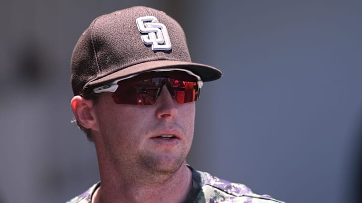 May 29, 2022; San Diego, California, USA; San Diego Padres shortstop Jake Cronenworth (9) looks on before the game against the Pittsburgh Pirates at Petco Park. Mandatory Credit: Orlando Ramirez-Imagn Images